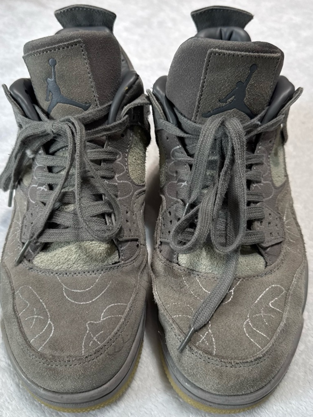 Retro Gray Suede Sneakers with Jumpman Logo. Glow in dark bottom